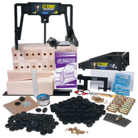 Collection of co2 dragster building materials, including the EZ Start Raceway and dragster blanks
