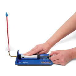 Hands launching a straw rocket from the mini straw rocket launcher