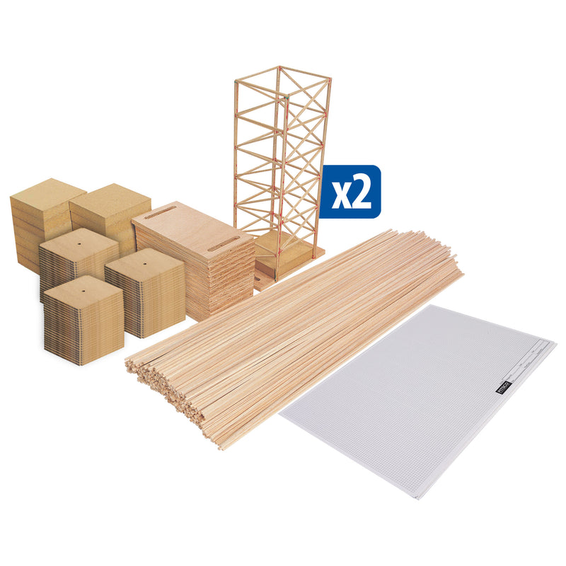 Collection of earthquake plates, balsa wood, and grid paper, with a model tower