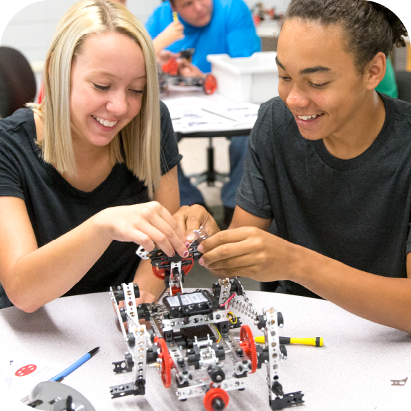 Male and female students building their TETRIX PRIME robot