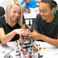Male and female students building their TETRIX PRIME robot